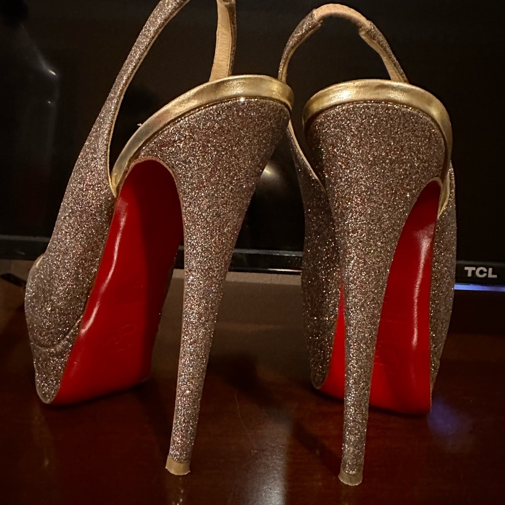 Christian Louboutin sparkle sling backs size 37. Worn twice.